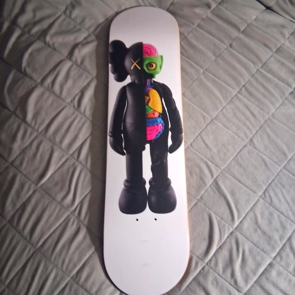 KAWS Black and Multicolor Wall Art Skateboard Deck - Picture 1 of 9